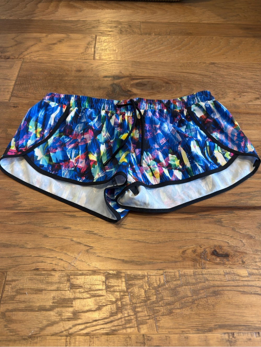 Fabletics Vibrant Brushstroke Print Athletic Shorts with Black Trim